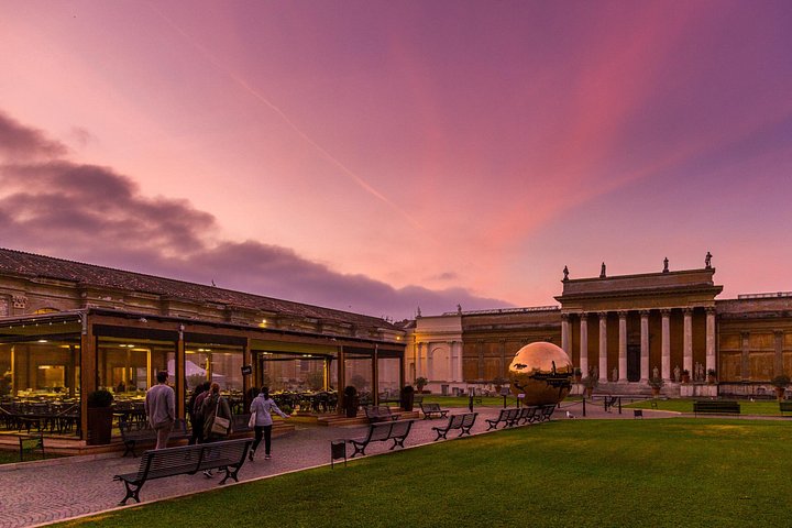 The Pinecone Courtyard under a pink morning sky
