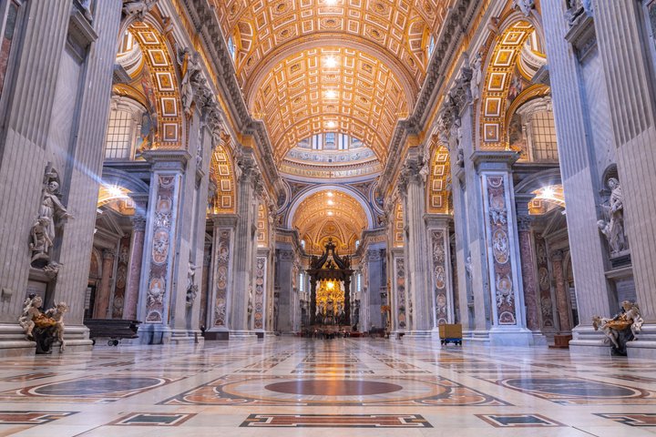 The nave and vaulted ceiling of St. Peter’s Basilica