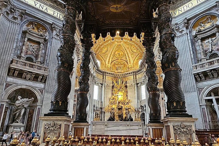 The bronze canopy and decorated altar area inside St. Peter’s Basilica